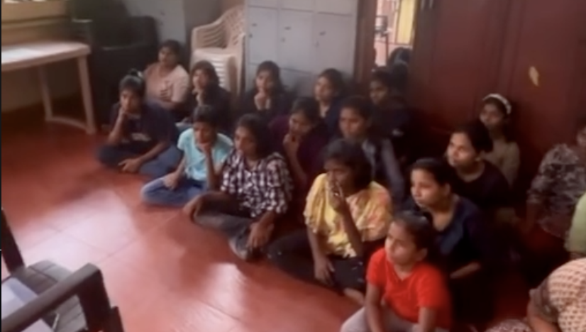 Girls seated together during a FinSpire session
